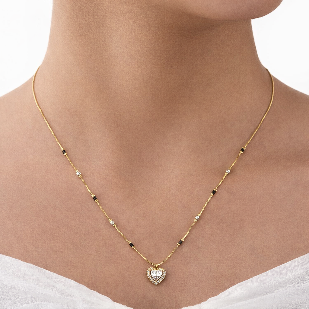 Elegant gold necklace with heart pendant
